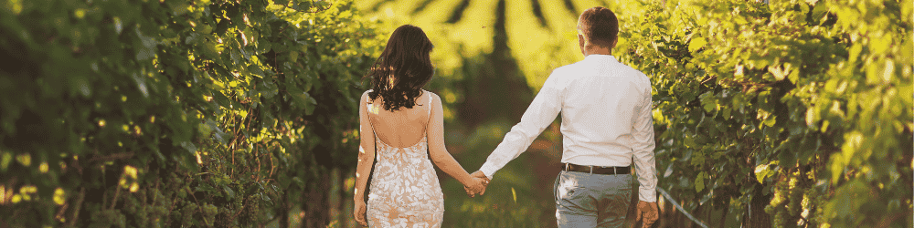 a couple celebrate their wedding in los angeles with lights in the background